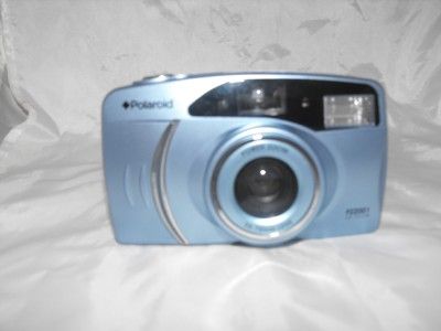 This is a used Powerzoom 2001,2x zoom 35 70mm lens Polaroid camera 