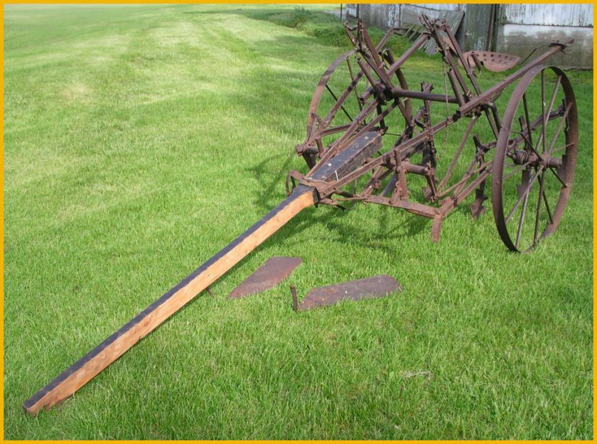   Steel Wheel One Row Cultivator Seat Stirrups Sweeps Old Iron  