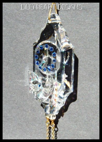 CUCKOO CLOCK AND BIRD MADE FROM SWAROVSKI CRYSTAL RETIRED  