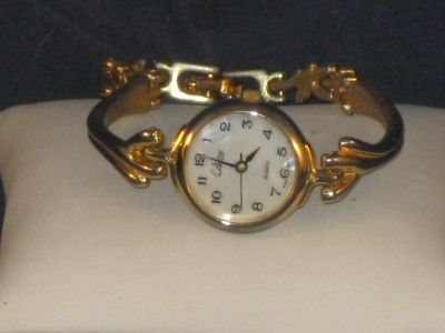 LADIES ELEGANT COLLEZIO QUARTZ GOLDTONE WATCH DAINTY WITH VERY UNIQUE 