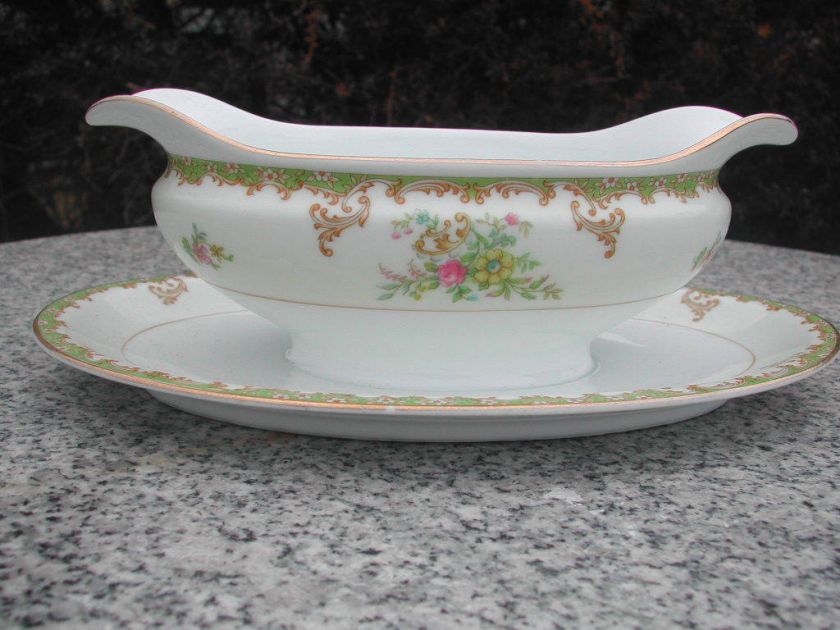 NORITAKE Japan marked with M gravy boat with foot attached  