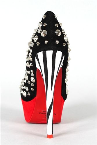 studded upper hidden platform with a red base and animal printed 